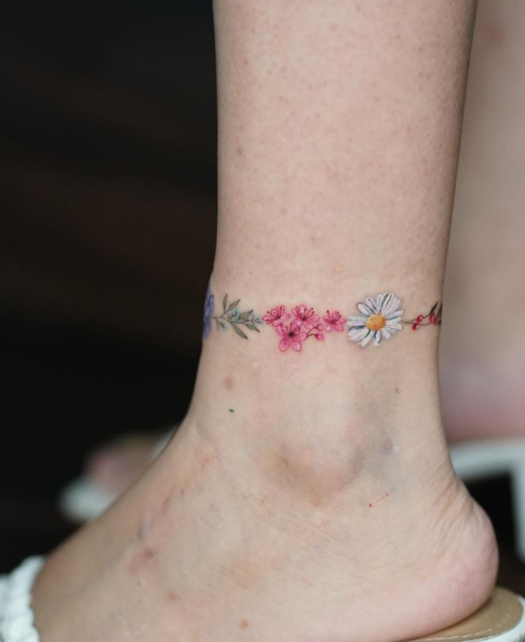 Band Tattoo With Flowers